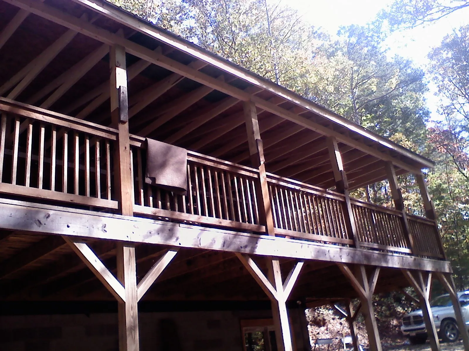 Timber framing under a new elevated porch and deck — Roof Leak Repair in Pinson by Roofing Brothers